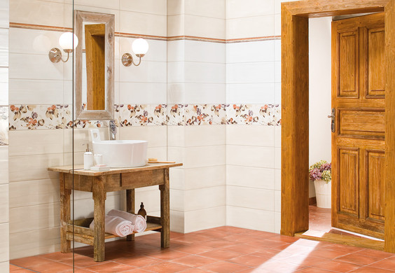 RAKO | Koupelna s lehce taženým stěrkovaným reliéfem. Květinová dekorace ve vícebarevném odstínu. 