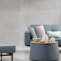 RAKO | Obývák v industriálním stylu s imitací betonu ve velkém formátu 60 x 120 cm.