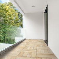 Laying of floor tiles in a dry technique