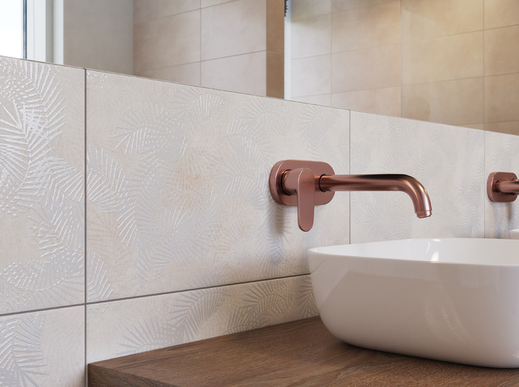 RAKO | Koupelna s imitací betonové stěrky a dekorací listů s třpytivým reliéfem.