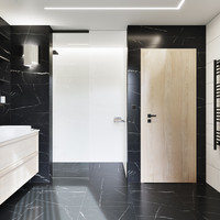 RAKO | Koupelna s designem černého mramoru se světlým žilkováním.
